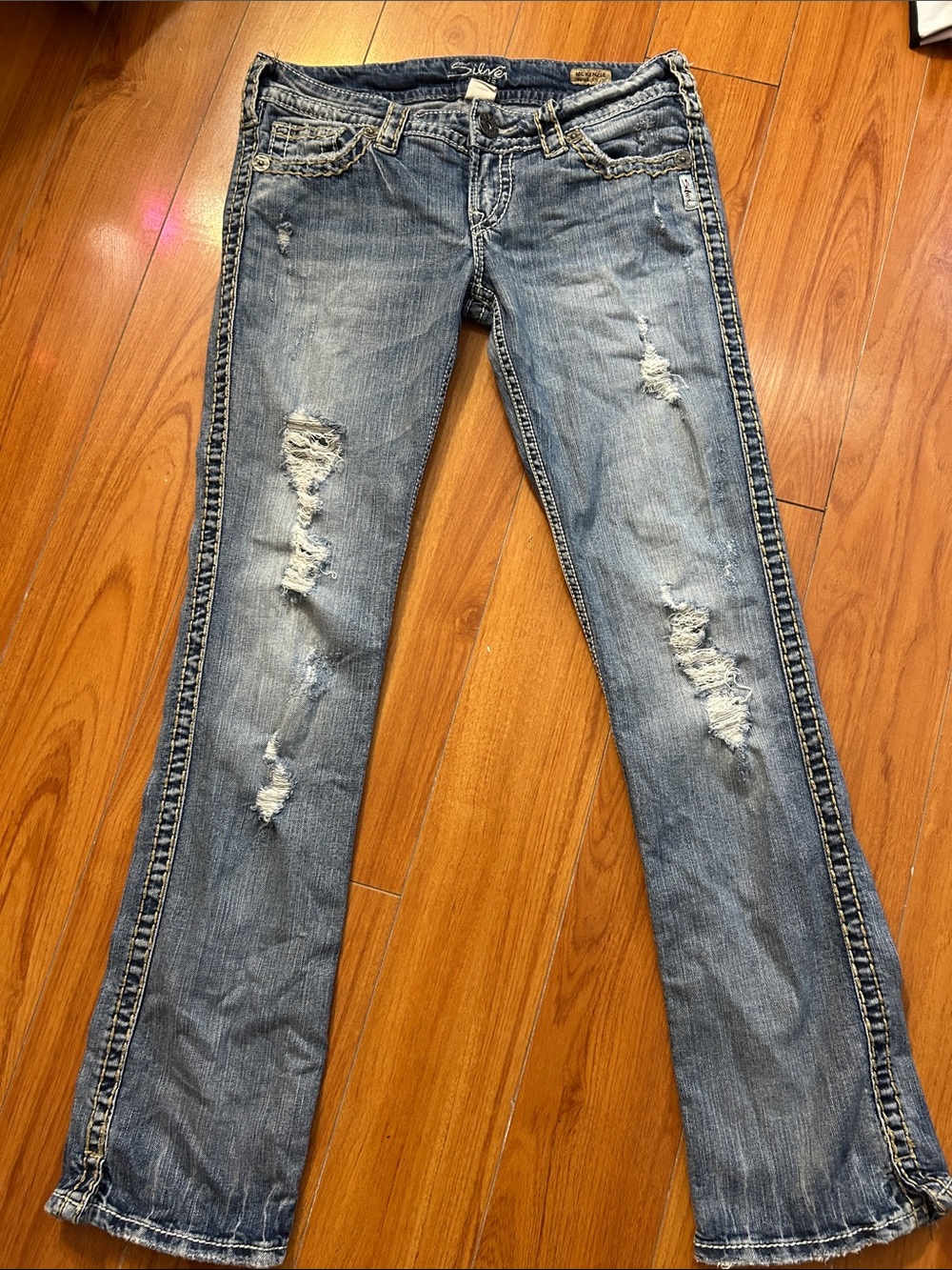 Silver Jeans Women's Light Blue Distressed Boot Cut Jeans